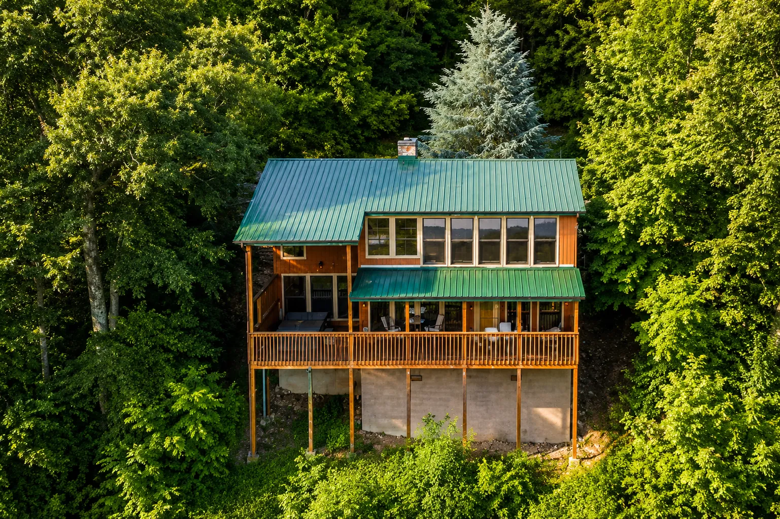 Renovated Gatlinburg cabin surrounded by green forest
